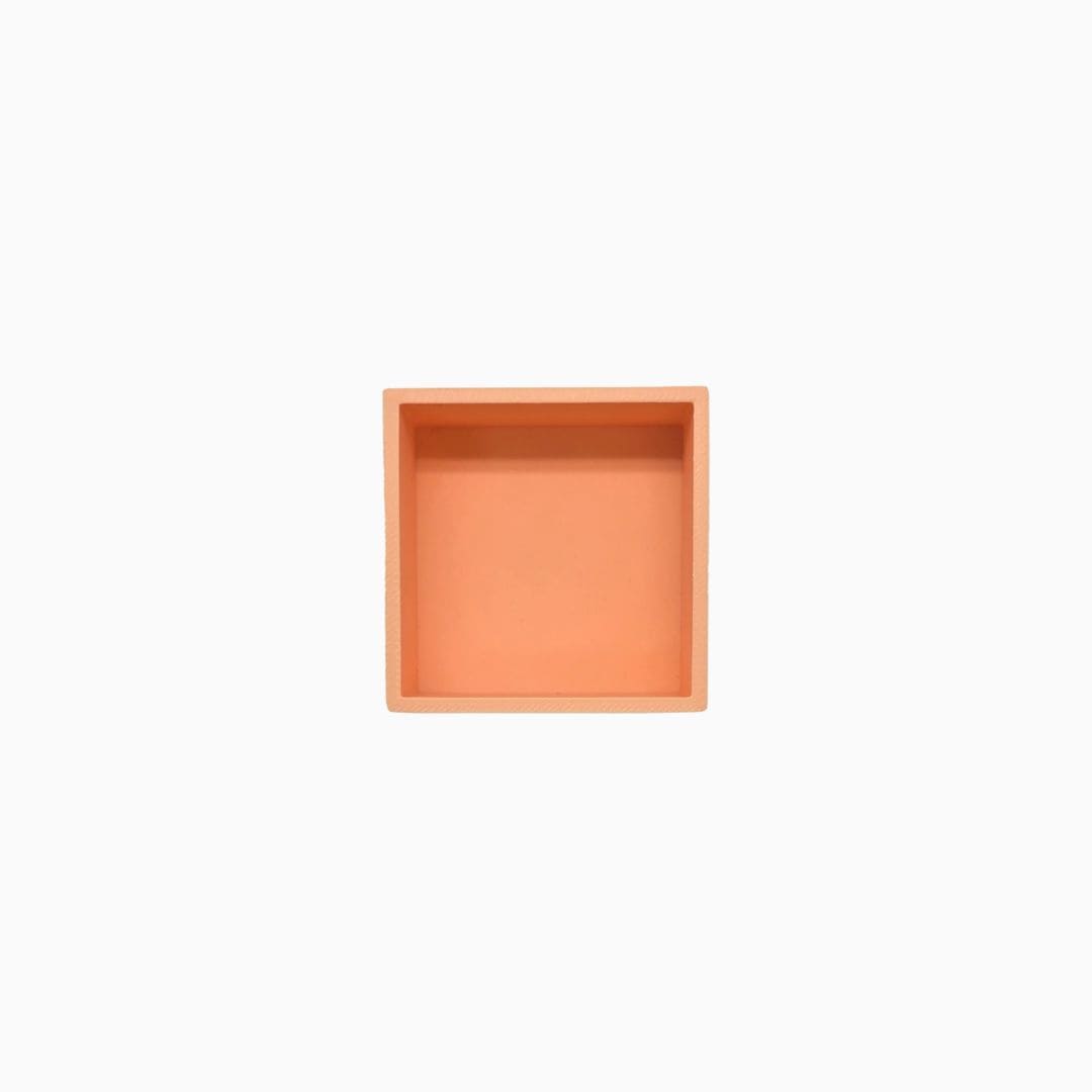 Grennn speelbakje 'mandigo' vierkant in de kleur pastel oranje