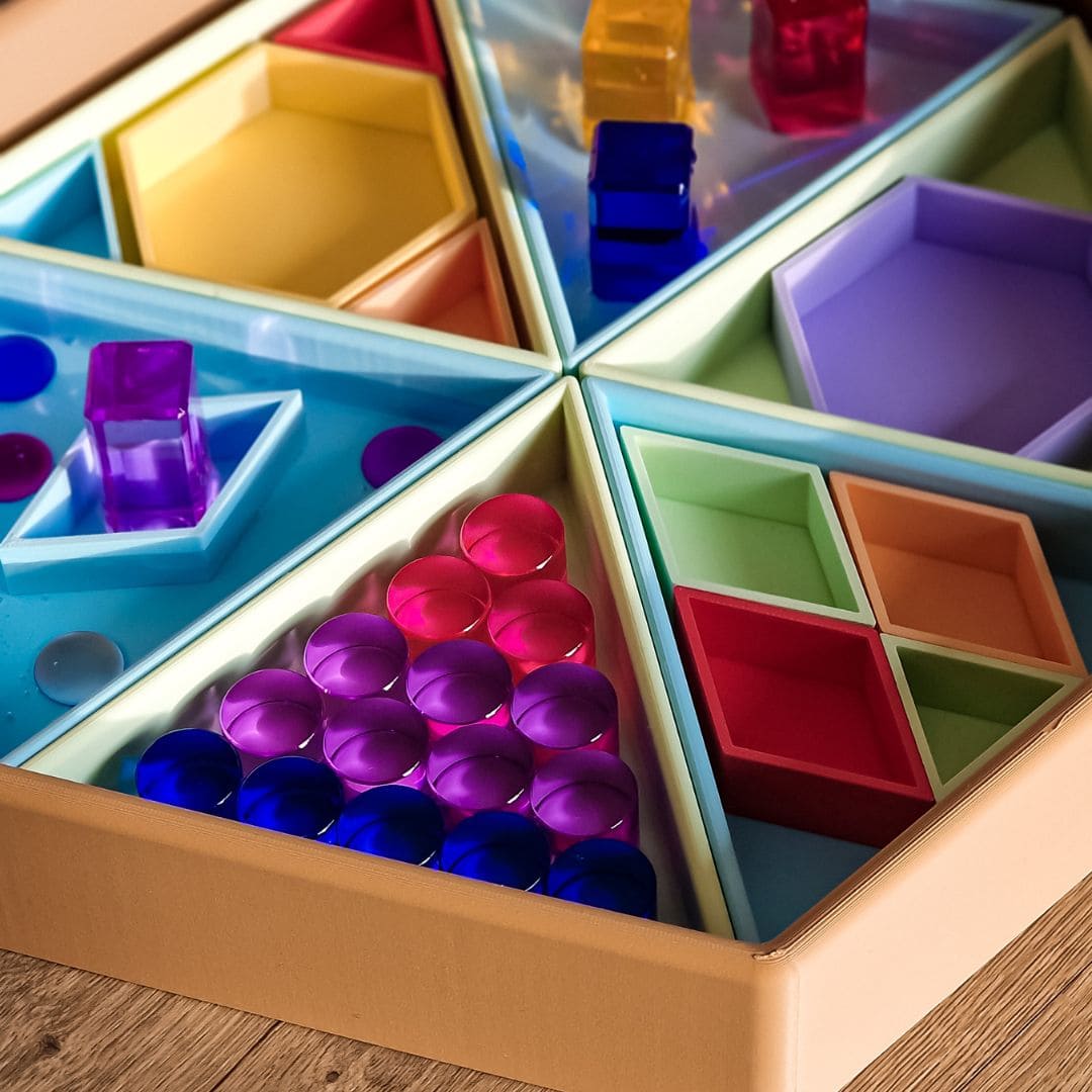 Bauspiel blokkenset met 64 licht doorlatende cilinder blokken van acryl in houten frame