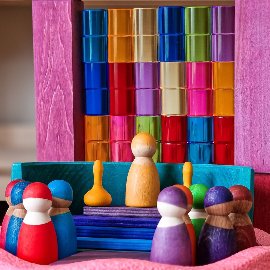 Bauspiel blokkenset met 64 licht doorlatende cilinder blokken van acryl in houten frame