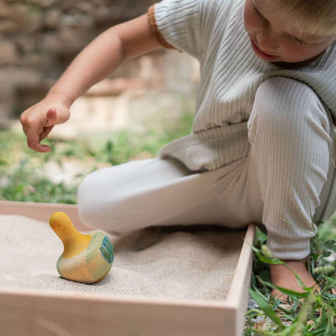 Grapat houten speelgoed tol flowing yellow bird