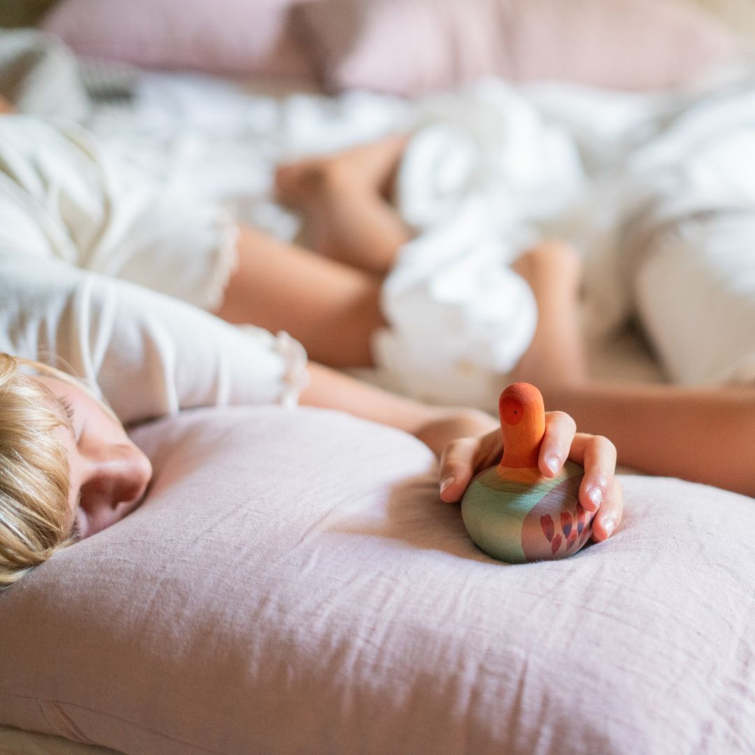 Grapat houten speelgoed tol Mellow orange Bird