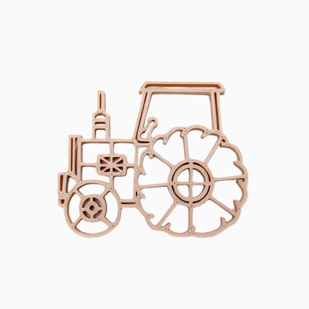 Grenn steker van tractor voor kinetisch zand