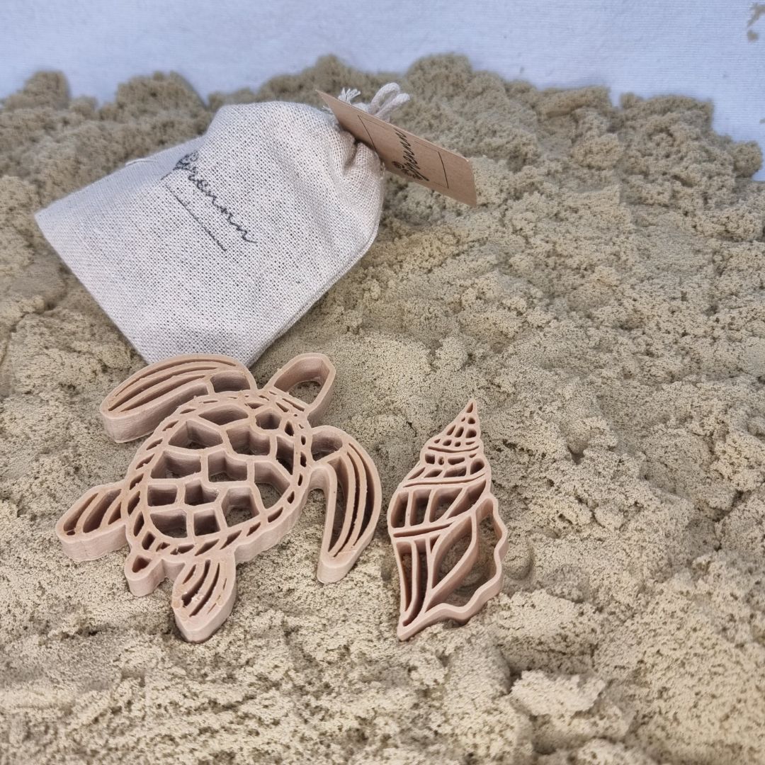 Grennn kinetisch zand vormpjes in de vorm van een schildpad en schelp