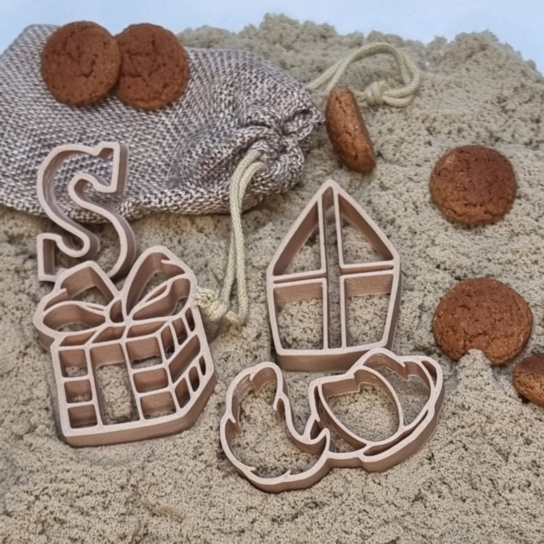 Grennn kinetisch zand vormpjes in sinterklaasthema met pakje, pietenmuts, chocolade letter en mijter