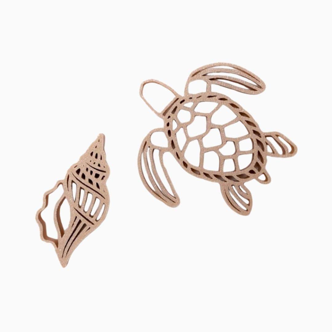 Grennn kinetisch zand vormpjes in de vorm van een schildpad en schelp