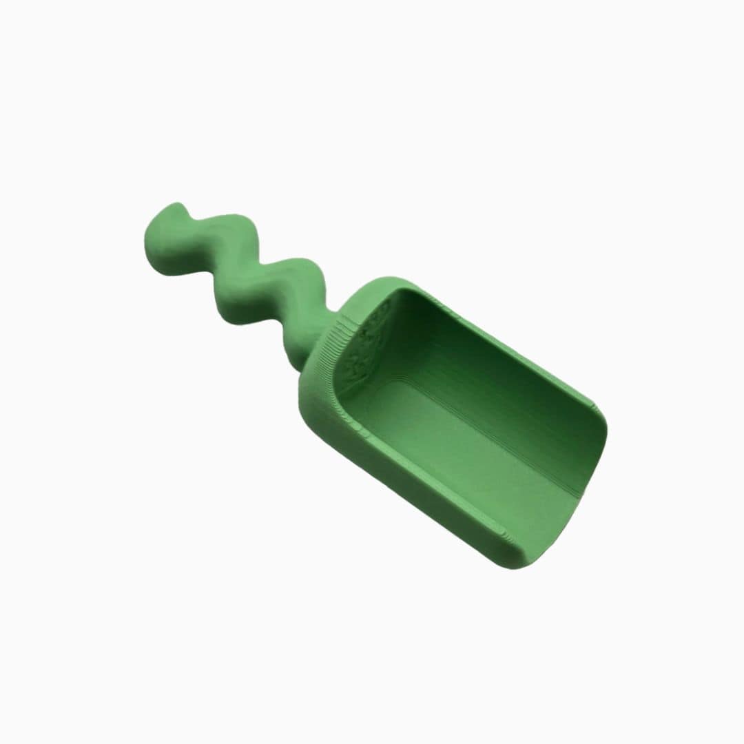 Grennn speelschep klein waves in de kleur regenboog groen