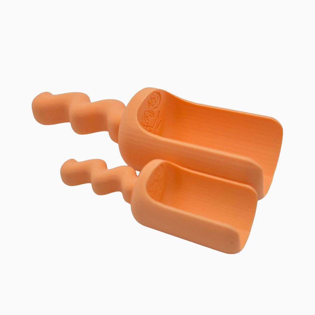 Grennn speelschep klein en groot waves in de pastel kleur lichtoranje