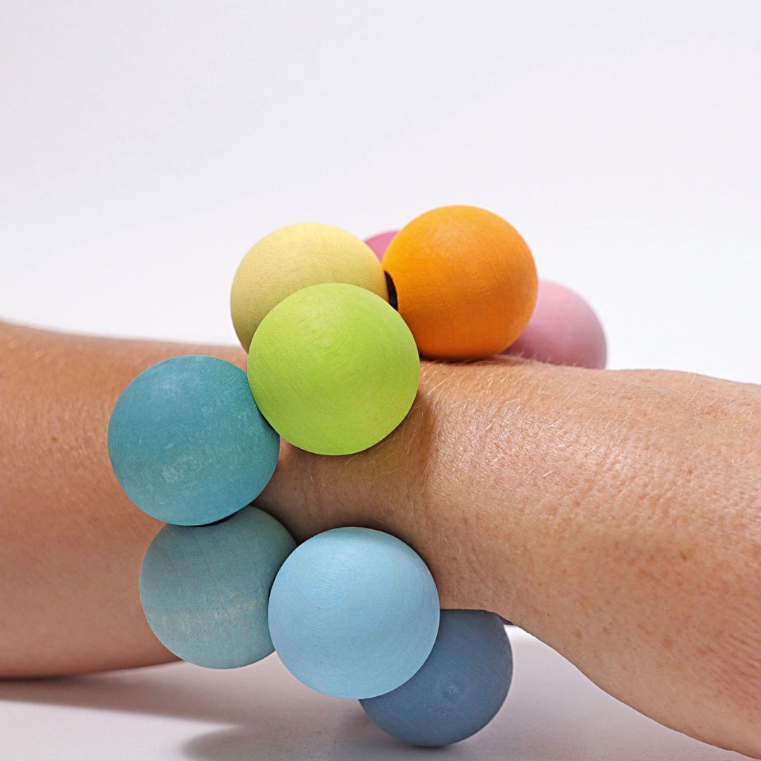 Grimms babyspeelgoed grijpspeeltje kralenbal pastel