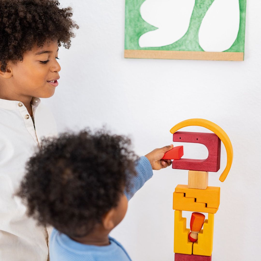 Grimms houten blokkenset desert sand met 26 bouwelementen in naturel, oranje, paars en rood voor fantasierijk open einde spel