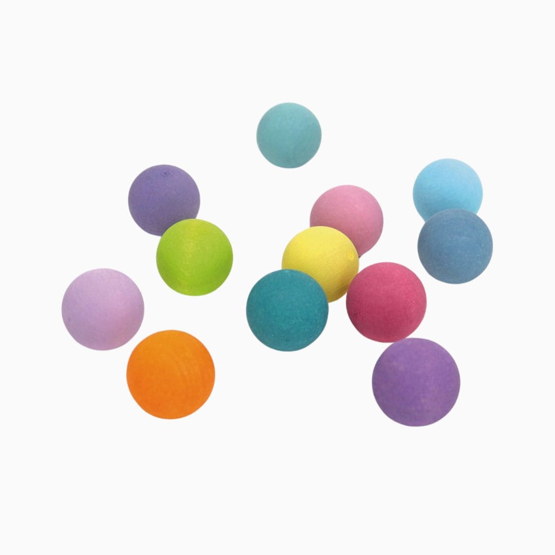 Grimms set van 12 kleine houten knikkers in pasteltinten