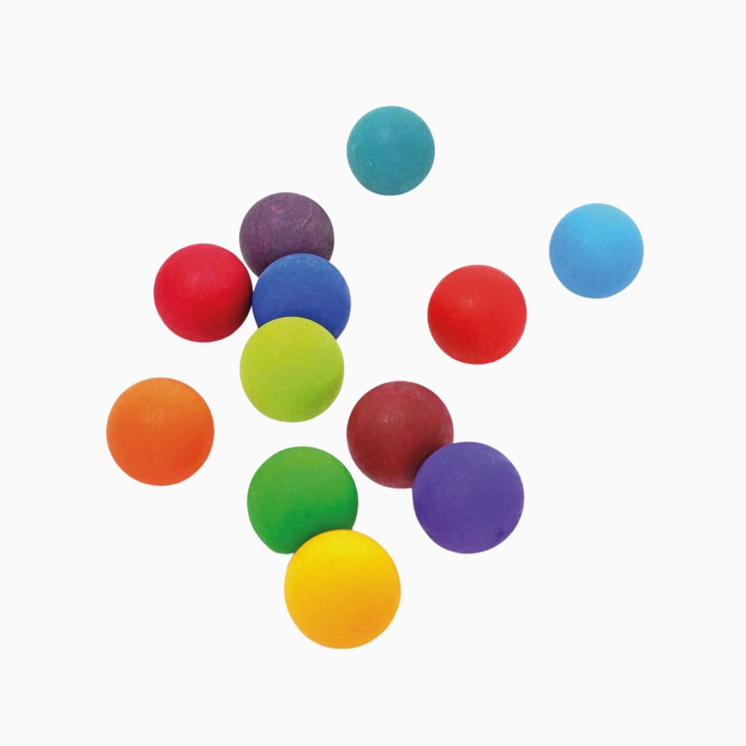 Grimm's set van 12 houten knikkers in regenboogkleuren