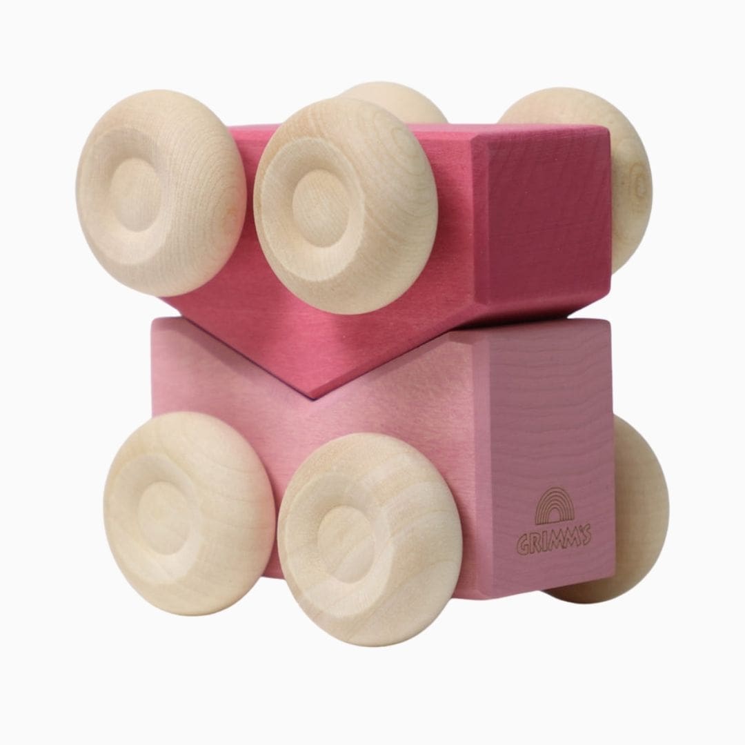 grimms set van twee houten, stapelbare auto's in de kleur roze