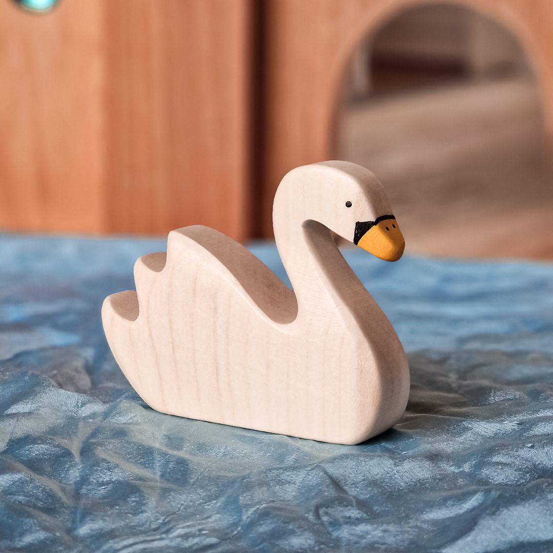 Holztiger houten speelfiguur zwaan van esdoornhout