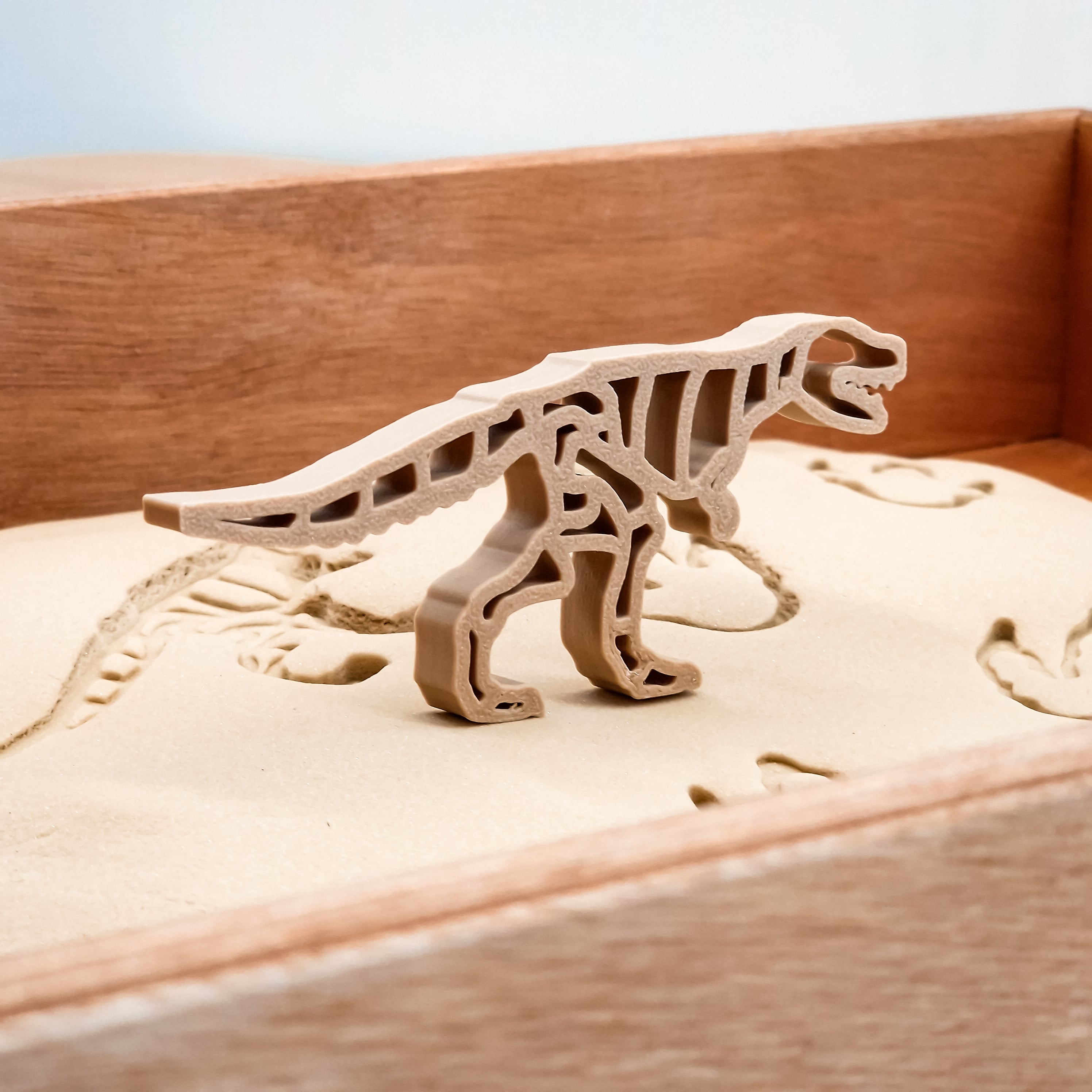 Grennn kinetisch zand vormpjes dinosaurus en poot