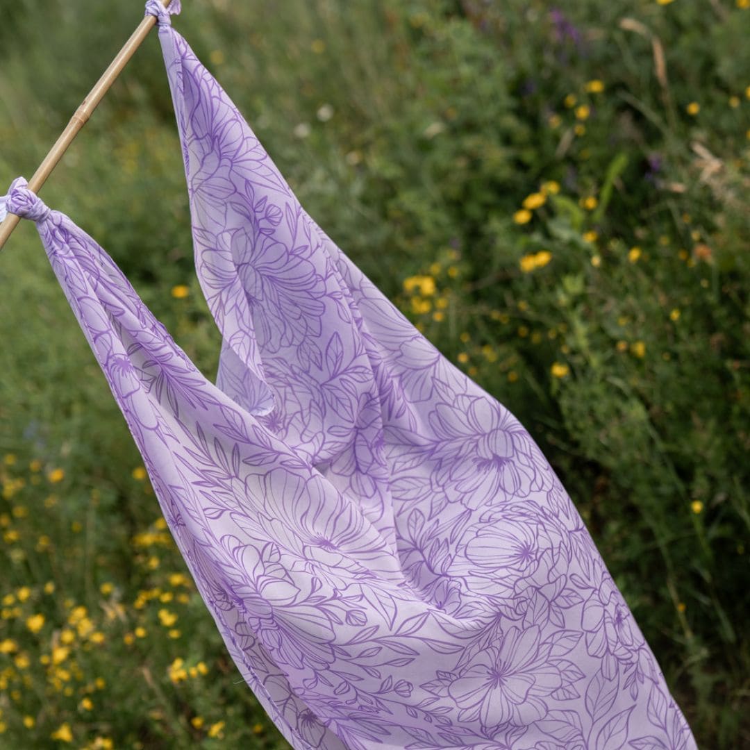 Little Botanic Label playcycle speeldoek met bloemenprint in de kleur lila