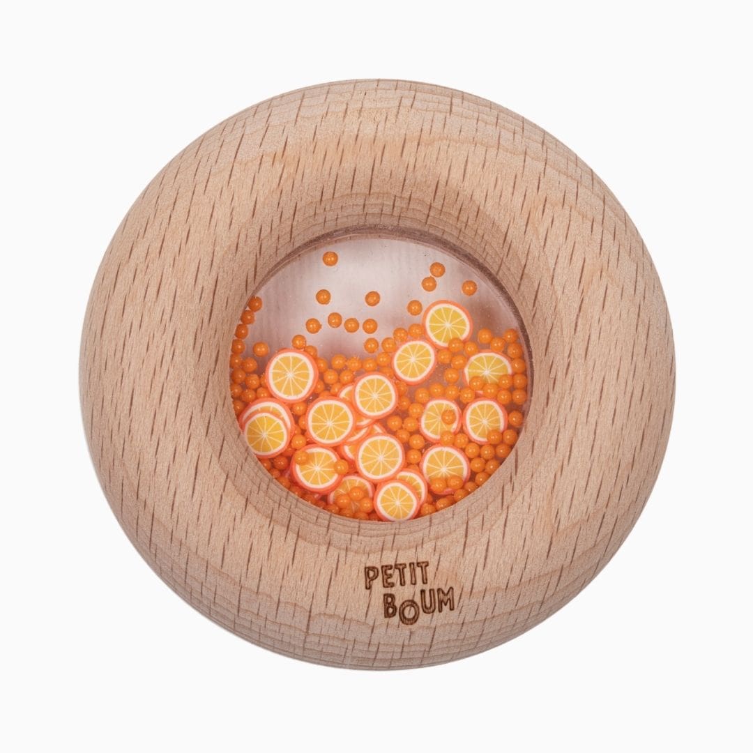 Petit Boum sensorische babyspeelgoed donut met sinaasappels