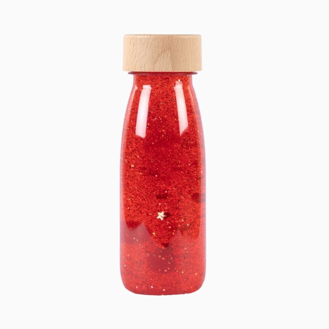 Petit Boum sensory bottle sensorische fles met glitters, pailletten en pompons in de kleur rood