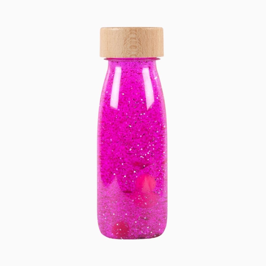 Petit Boum sensory bottle sensorische fles met glitters, pailletten en pompons in de kleur roze