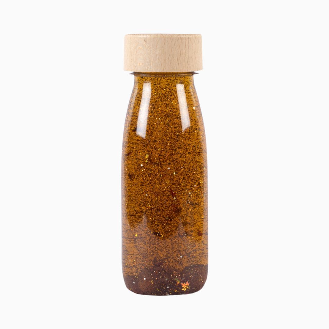 Petit Boum sensorische fles met glitters in de kleur sienna goudbruin