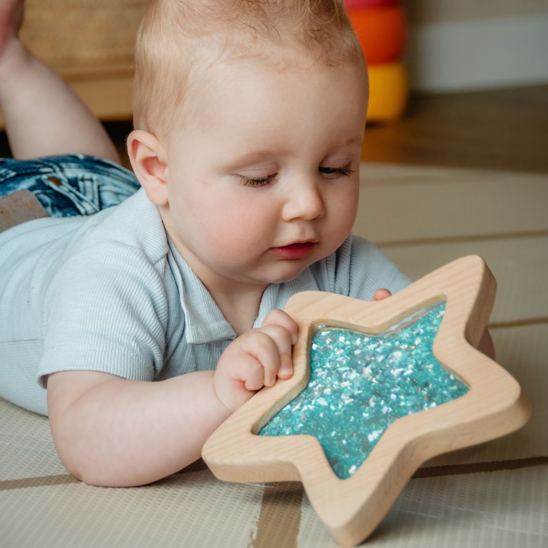 Petit Boum sensorische ster blauw met glitters glow in the dark