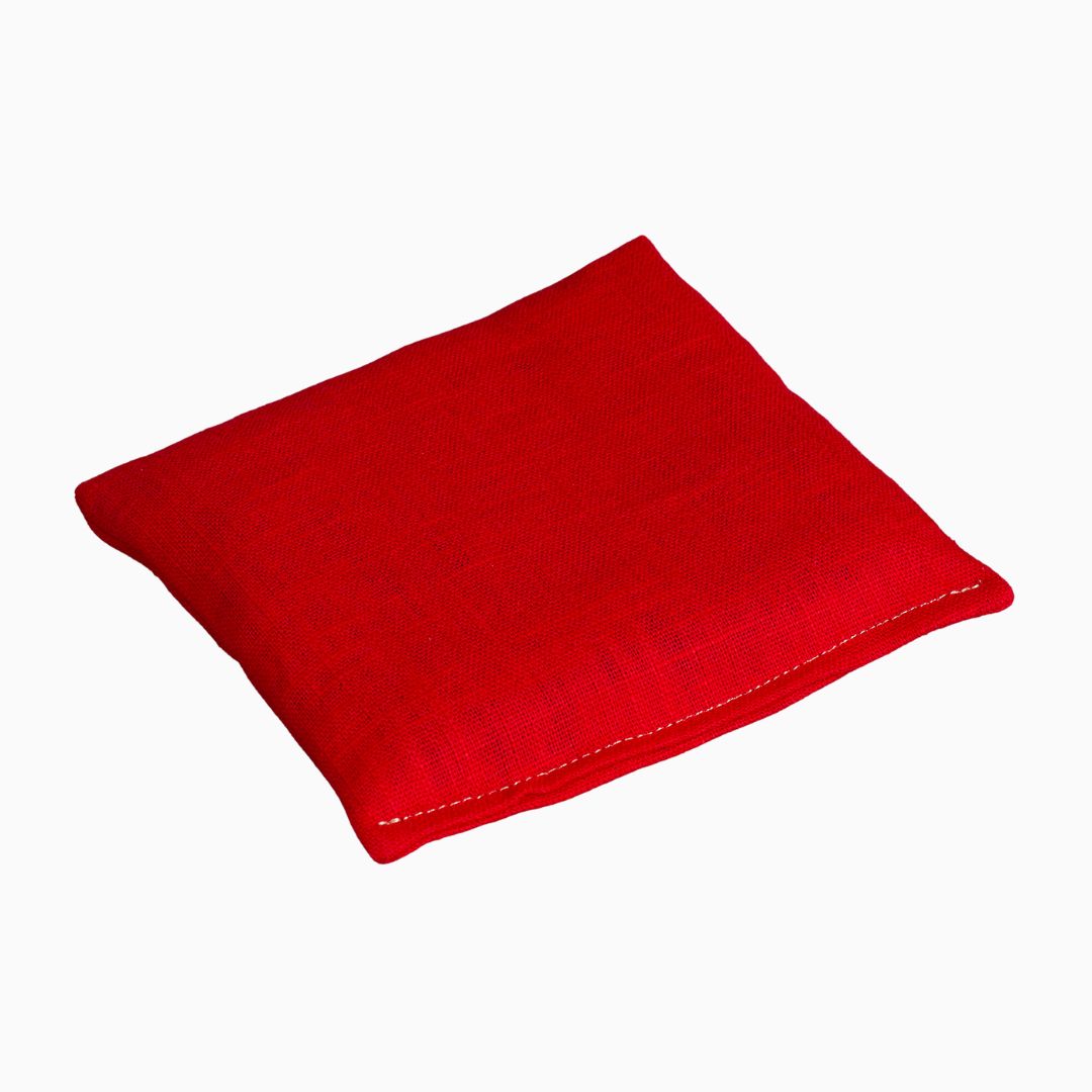 Sensorisch pittenzakje in de kleur rood van Little Botanic Label