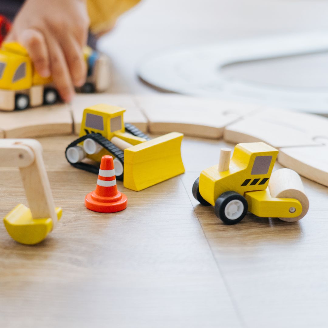 Gele houten bulldozer en wals van Plantoys