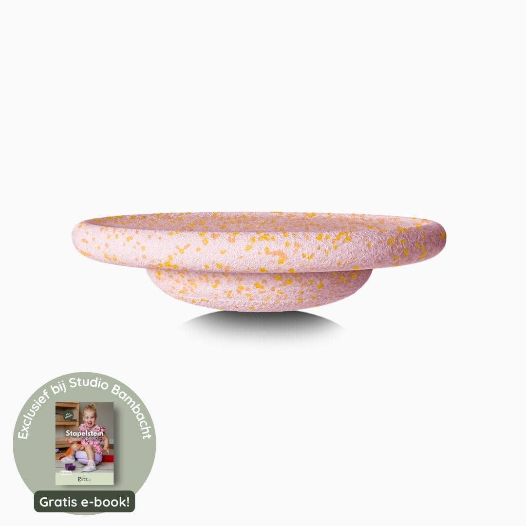 Stapelstein balance board petal in de kleur licht roze met spikkels in licht oranje en geel
