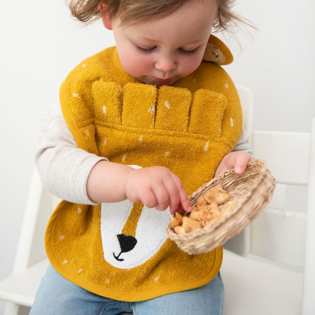 Trixie badstof slab van biologisch katoen in de kleur okergeel Mr. Lion leeuw