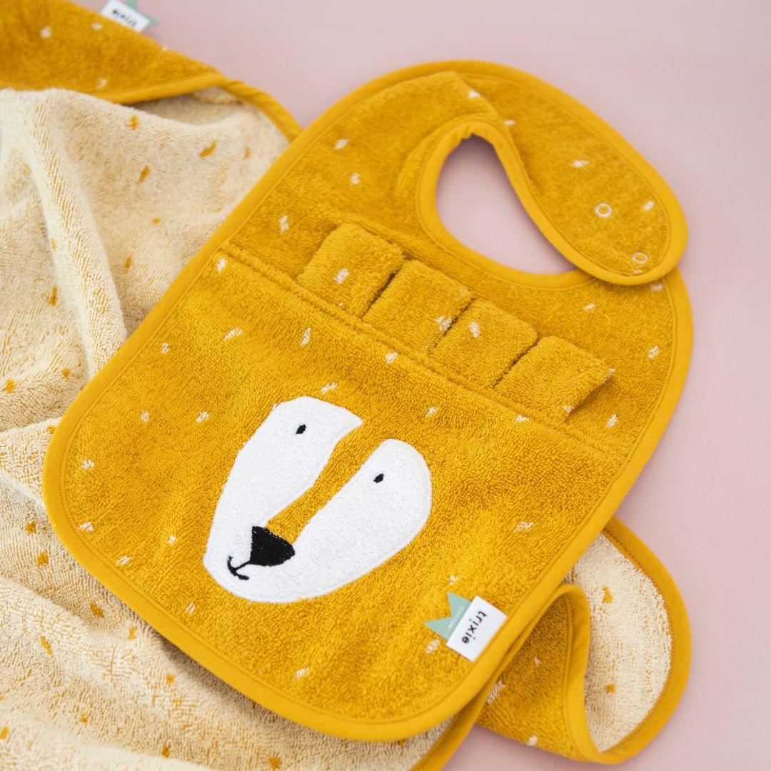 Trixie badstof slab van biologisch katoen in de kleur okergeel Mr. Lion leeuw