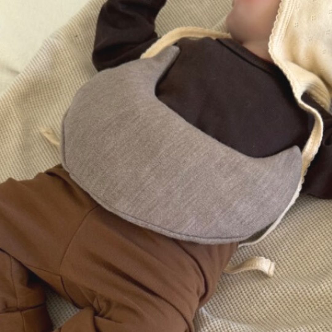 Warmtemaantje warmtekussen in maanvorm gevuld met biologische kersenpitten