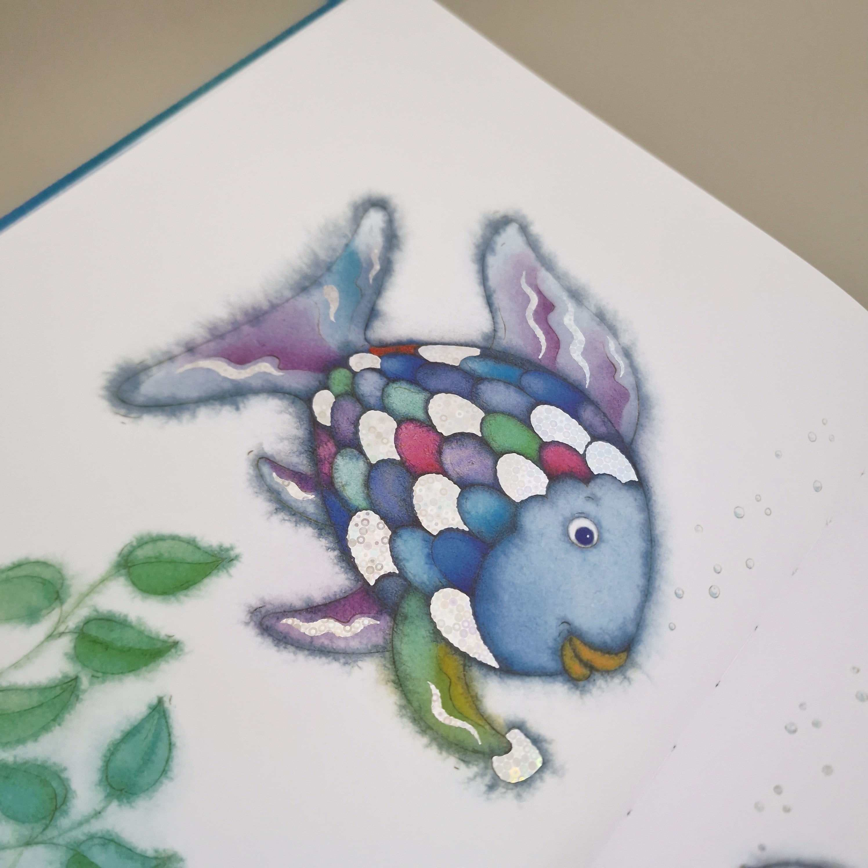 Prentenboek de Mooiste vis van de zee van auteur Marcus Pfister door uitgeverij De Vier Windstreken