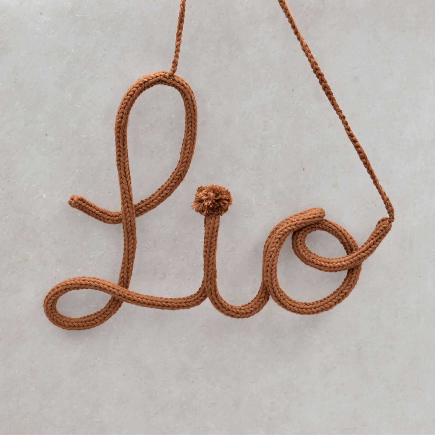 Punniknaam is een naamhanger voor op de kinderkamer handgemaakt door Iris van Studio Bambacht