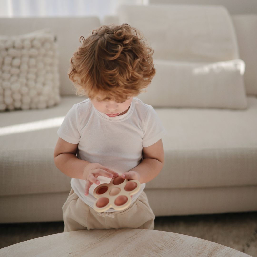 mushie fidget toy bloem rose om te poppen