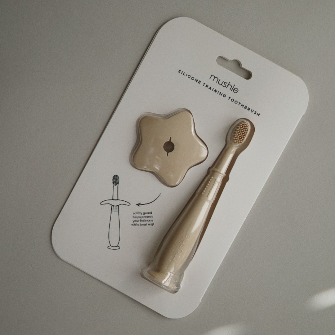 Mushie eerste tandenborstel voor kinderen om te oefenen shifting sand