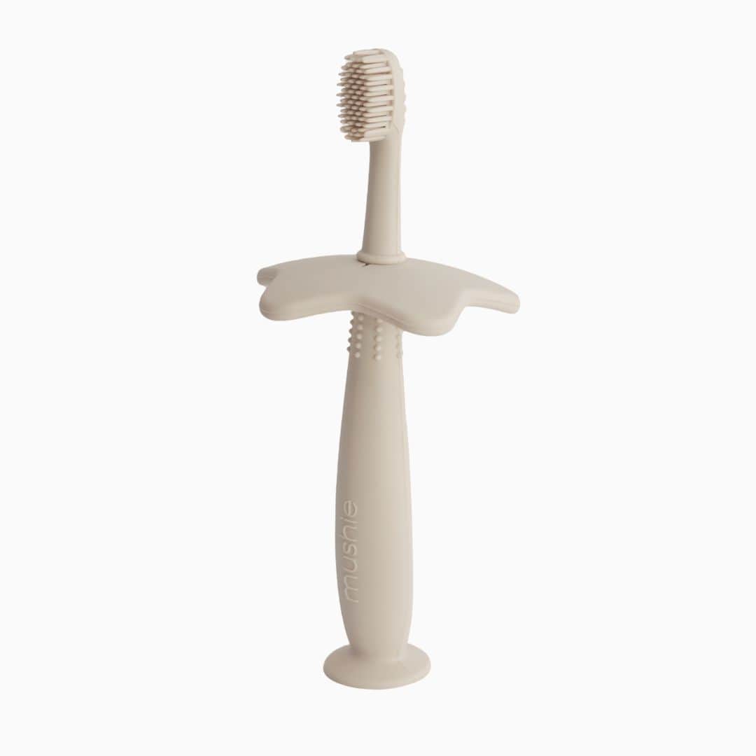 Mushie eerste tandenborstel voor kinderen om te oefenen shifting sand