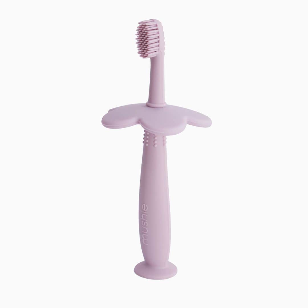 Mushie eerste tandenborstel van siliconen voor kinderen om te oefenen in de kleur lila