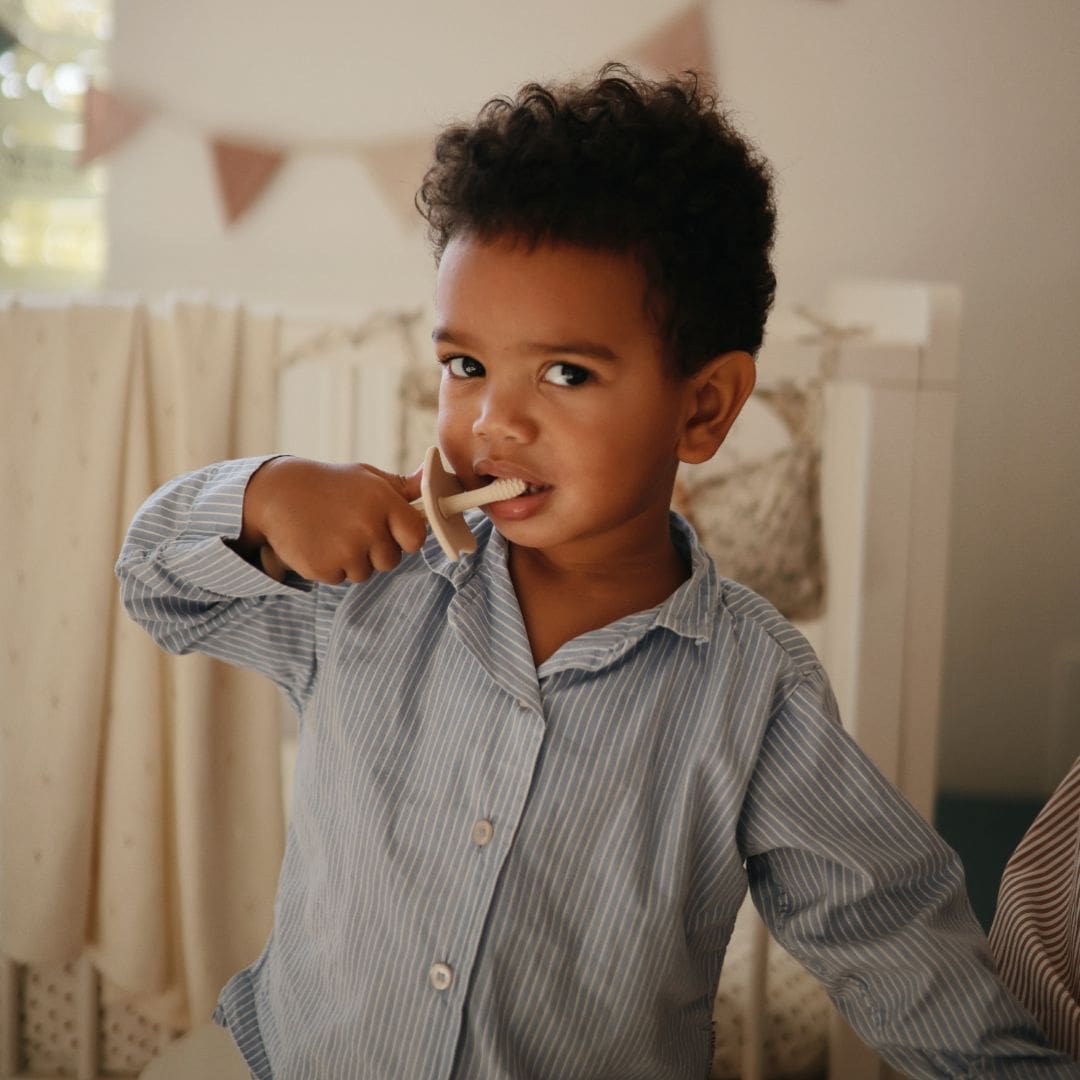 Mushie eerste tandenborstel voor kinderen om te oefenen shifting sand