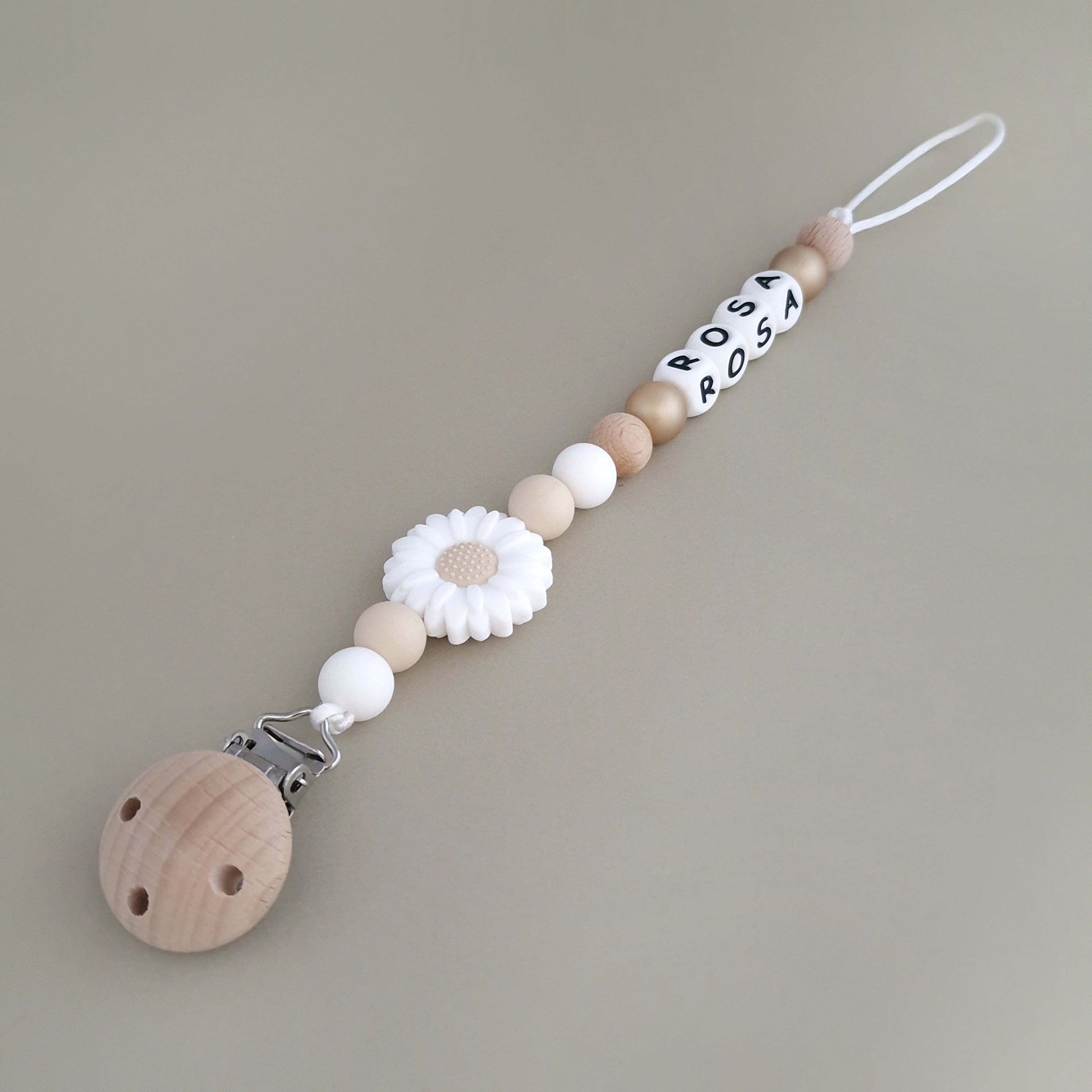 speenkoord met naam van Studio Bambacht madelief bloem wit goud beige