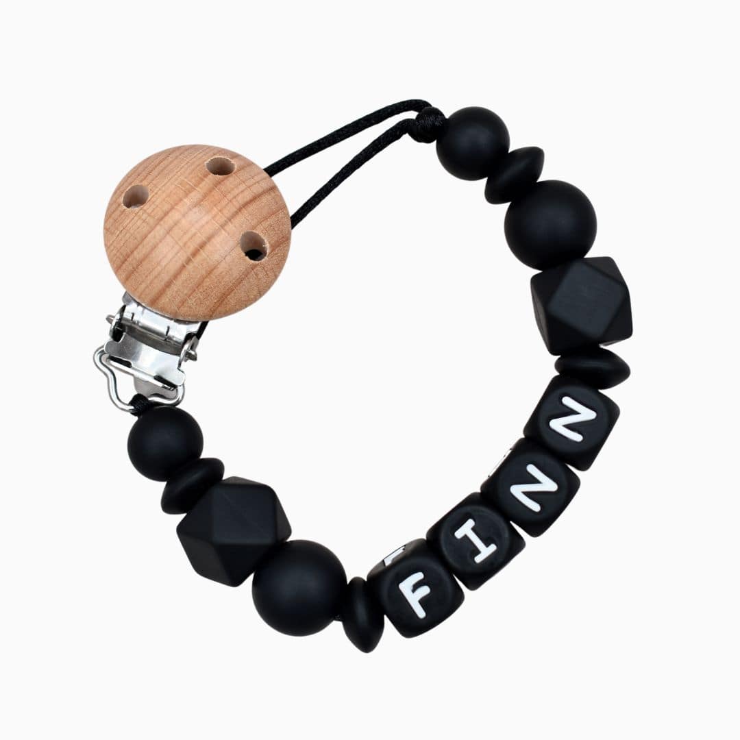Veilig en uniek speenkoord met naam van Studio Bambacht in de kleur zwart