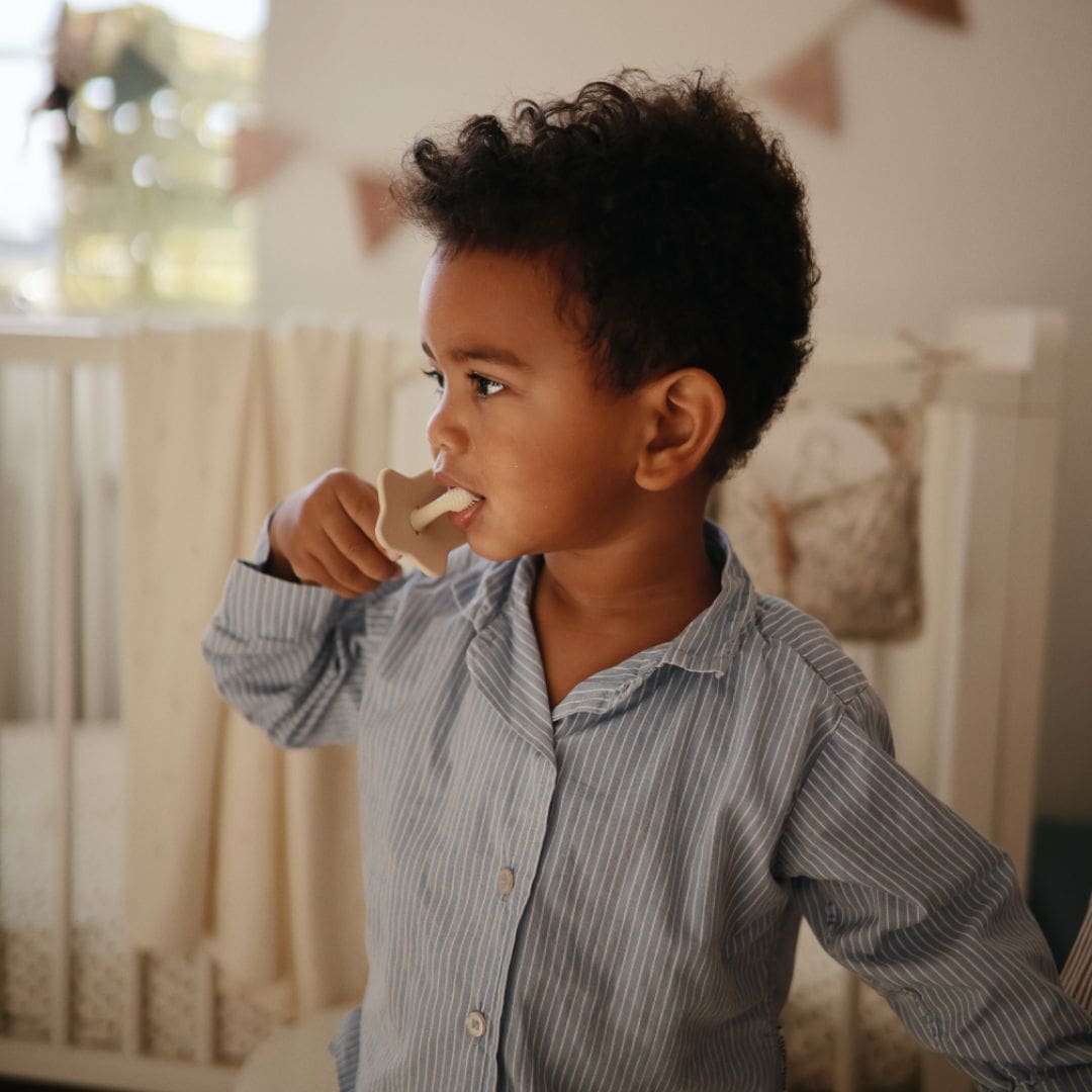 Mushie eerste tandenborstel voor kinderen om te oefenen shifting sand