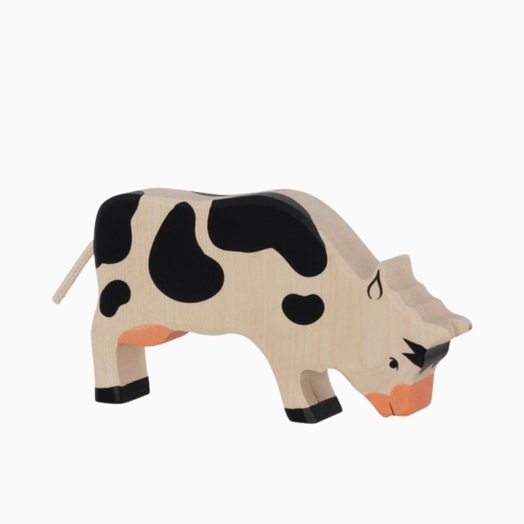 Holztiger houten speelfiguur koe grazend