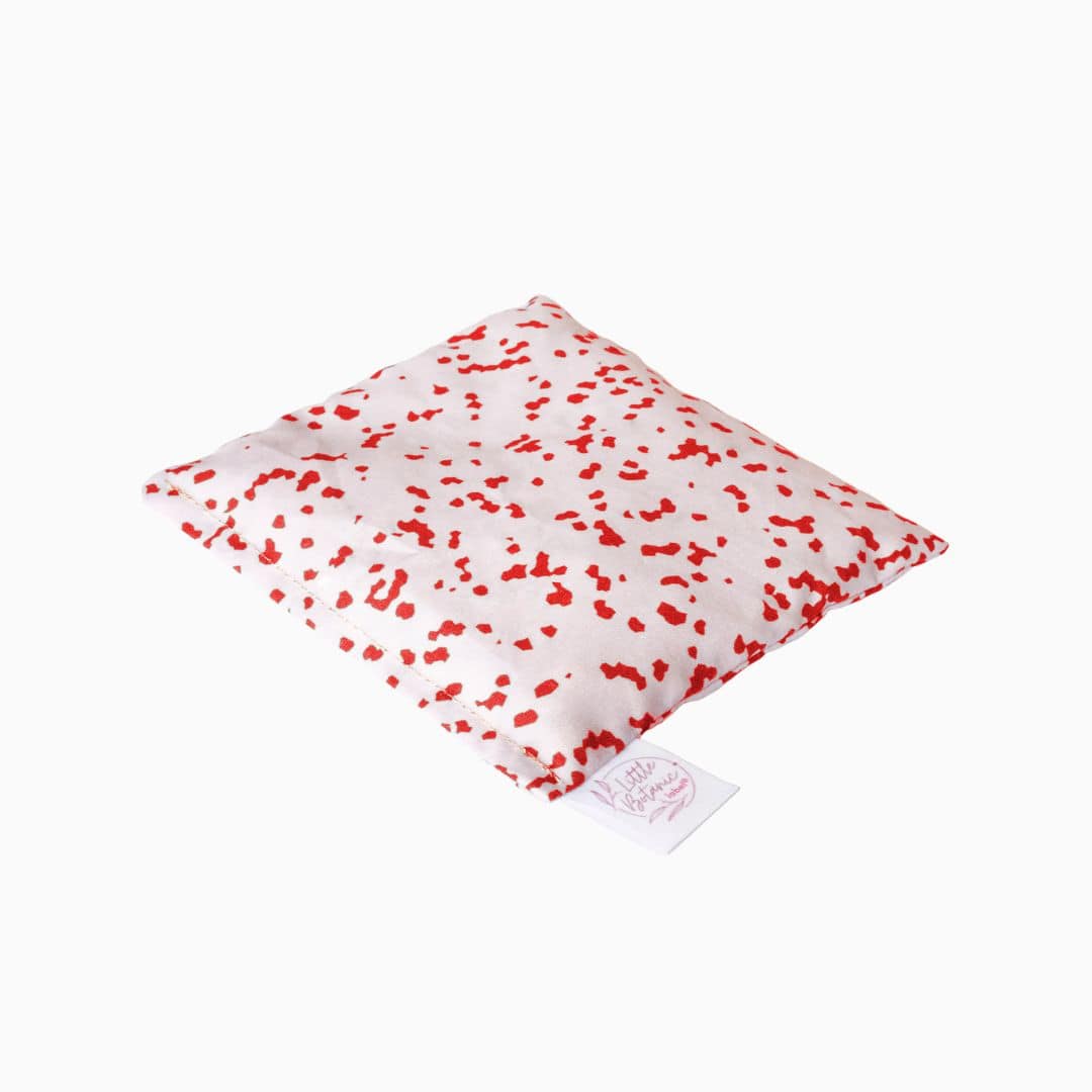 Sensorisch pittenzakje van Little Botanic Label die match met de Stapelstein kerstspecial blush met red sprinkles