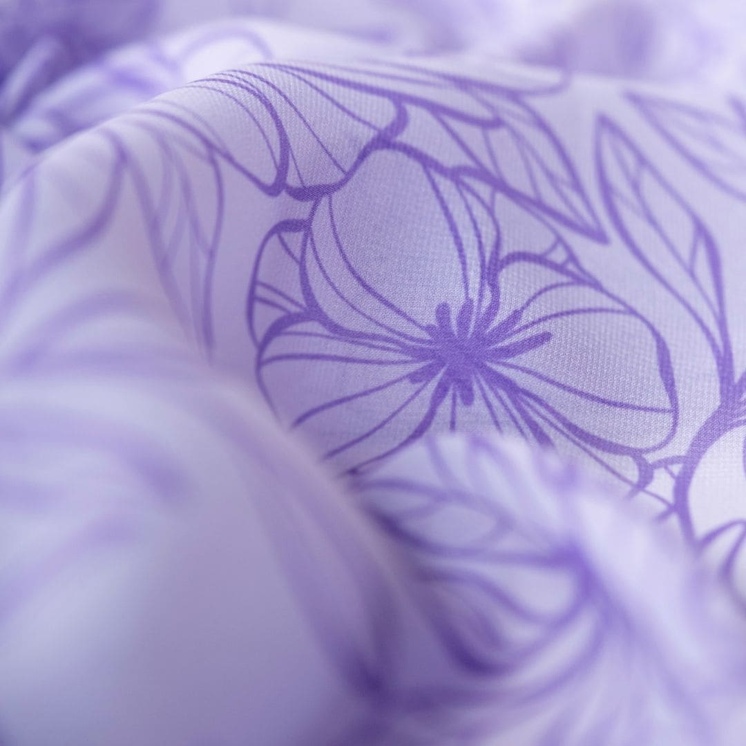 Little Botanic Label playcycle speeldoek met bloemenprint in de kleur lila