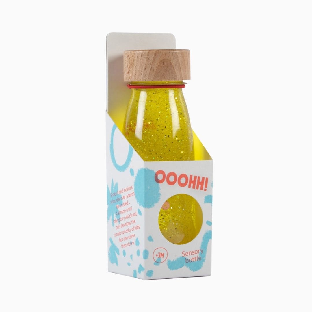Petit Boum sensory bottle sensorische fles in de kleur geel met glitters, pailletten en pompons